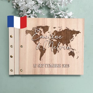 Modern wooden wedding guest book personalized in relief world map travel theme