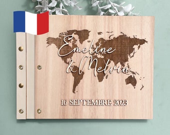 Modernes Hochzeitsgästebuch aus Holz, personalisiert im Relief-Weltkarte-Reisethema