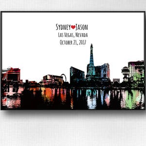 May include: A colorful cityscape silhouette of Las Vegas, Nevada with the text "Sydney &hearts; Jason Las Vegas, Nevada October 21, 2017" above the skyline.