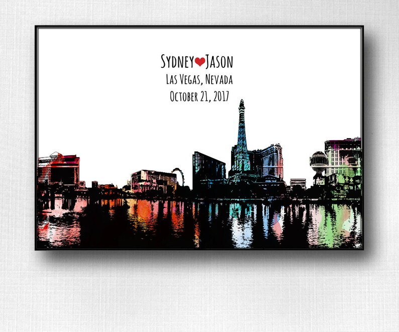 May include: A colorful cityscape silhouette of Las Vegas, Nevada with the text "Sydney &hearts; Jason Las Vegas, Nevada October 21, 2017" above the skyline.