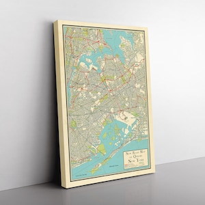 May include: Vintage map of Queens, New York City, printed on canvas. The map shows the borough's streets, parks, and waterways in a light blue, green, and red color scheme. The text "New York Map of Queens New York" is printed in the bottom right corner.