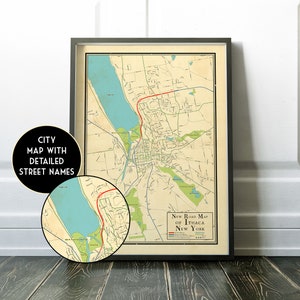 May include: Vintage style road map of Ithaca, New York with detailed street names. The map is printed on cream colored paper and framed in a black frame. The map shows Cayuga Lake and the surrounding area.