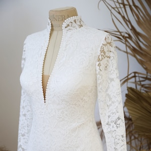 Romantic Wedding Lace Bodysuit with Buttoned Back and Deep V neck. Plunge Neck Bodysuit with Long Sleeves | Justin