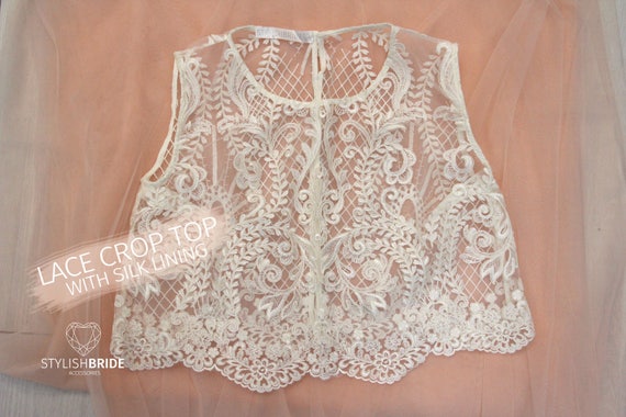 white lace sleeveless top