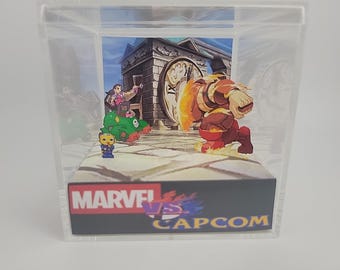 Cubo de exhibición de dioramas de videojuegos retro Marvel Vs Capcom