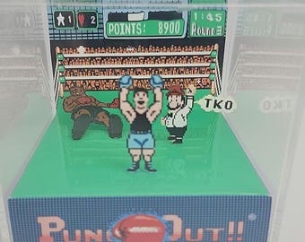Cubo de exhibición de dioramas del videojuego retro Punch Out de Mike Tyson