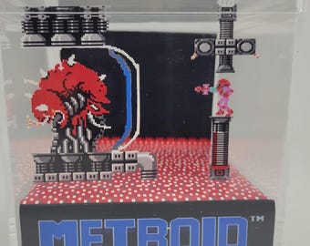 Cubo de exhibición de diorama del videojuego retro Metroid
