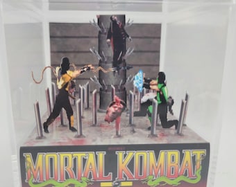 Cubo diorama de exhibición del videojuego retro Mortal Kombat 1