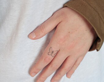 Small Butterfly Tattoo On Wrist