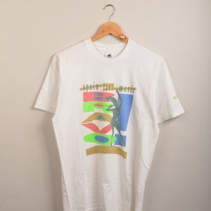 vintage 90s print t-shirt, vintage holiday t-shirt, vintage cartoon shirt, vintage print tshirt, 90s band tee shirt, holiday tshirt