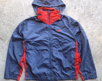 Vintage Nike 90s Full Zip Windbreaker Blue & Red Size XL | nike logo track jacket, Nike vintage, oversized sportswear oversized track jacket