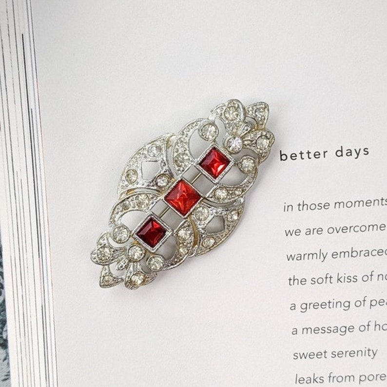 silver & red rhinestone costume statement brooch image 1