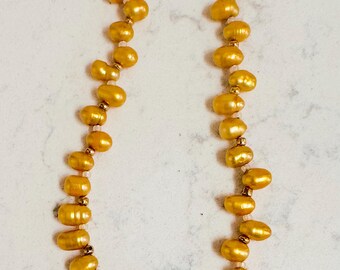 Gold Rush! Golden Cultured Pearls with Delica Glass spacer beads and a Gold filled toggle clasp. 14.5 inch Choker necklace or wrap bracelet.