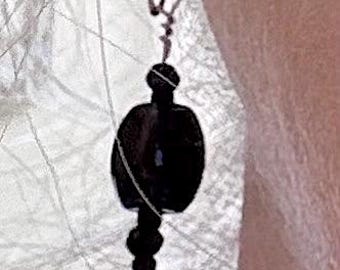 Faceted Black Spinel & Jet 3 stone dangle earrings. Sterling Silver ear wires. 1 1/2 inches long. Basic Black gemstone earrings. Black gems