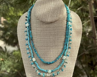 Aqua Vista. 3 strand Turquoise, Blue Peruvian Opal ovals, Blue Apatite and Aqua Goshenite necklace. Silver filled toggle clasp. 20" long.