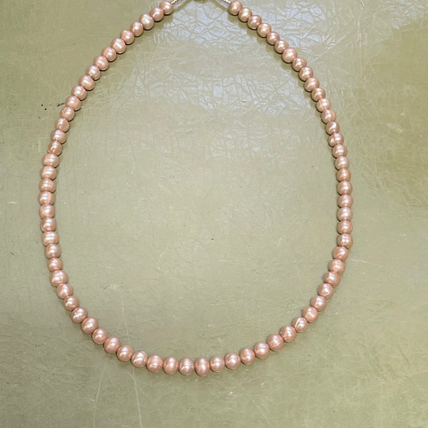 Caramel Pearls; Caramel color semi-round Cultured Pearls necklace with a Gold filled lobster claw clasp, 17 1/2 inches long