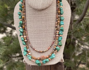 Arizona. 3 strand Autumn, Cream, LeopardSkin & Picture Jasper, wooden beads, Turquoise nuggets and a Silver filled toggle clasp. 21 1/2 inch