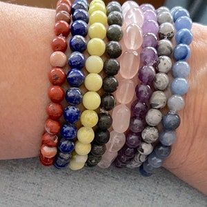 Energy Bracelets. Red Flake Jasper, Lapis, Peridot Jasper, Sunset Jasper, Rose Quartz, Gray Crazy Lace Agate, Blue Aventurine on elasticThis