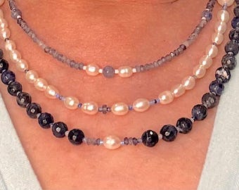 Cloudy With a Chance of Blue Skies. 3 strand necklace of Cultured white Fresh Water Pearls, Iolite, Sodalite & Sterling Silver toggle clasp