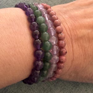 Spring 2025 Energy Bracelets! Rhodonite, Light Amethyst, Green Aventurine and Dark Amethyst all strung on elastic cord.  Healing bracelets.