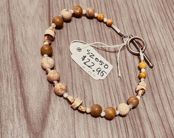 Picture & Honey Jasper with Wooden beads. Sterling Silver toggle clasp. 7 1/2 " long. Neutral sand colors. Unisex bracelet.