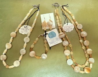 4 piece set. Honey Pot has Aragonite tubes, Honey Opal discs and ovals, Onyx discs, Sterling. Bracelet, earrings, 1 or 2 strand necklaces.