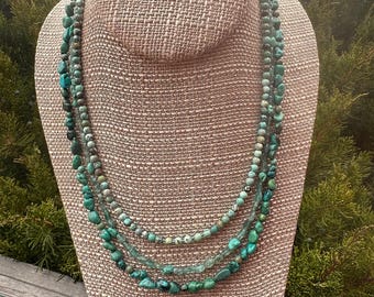 Route 66. 3 strand Aqua Apatite, Bluegreen Turquoise rounds, Turquoise nuggets and a Gold filled slide and lock clasp. December's birthstone