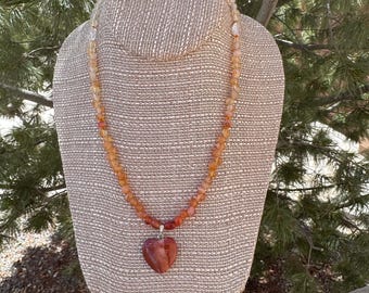 Mixed Agates with a Red Agate Heart pendant. Pewter Heart toggle clasp. 17 inches long. Autumn colors. Fall colors. Heart necklace.