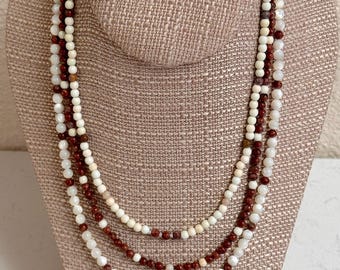 Maddie! 3 strand Bamboo Agate, Magnesite, Mother of Pearl and Gold filled slide and lock clasp. Short strand 16 1/4", longest 19 1/2 inches.