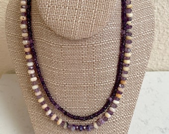 Amethyst is February's birthstone and Opal, Ocotber's birthstone. October and February is a 2 strand necklace with a Sterling Silver clasp