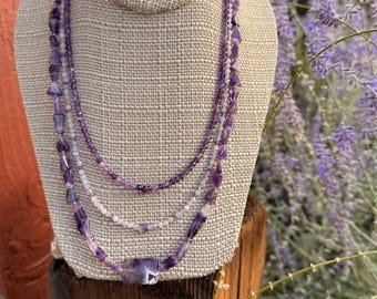 Amethyst Trio. All Amethyst with a silver filled slide and lock clasp. February's birthstone. 21 inches. Stone of Royalty!