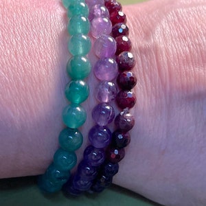 Energy Bracelets; Green Aventurine, Amethyst and Faceted Garnet strung on elastic. Inner Harmony, Relieves Stress and Aids Circulation