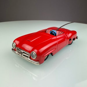 1950s toy car Mercedes W121 - vintage metal wind-up car automobile Mercedes-Benz 190SL