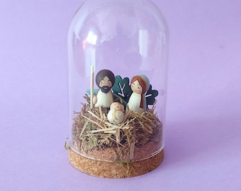 Christmas Nativity Scene in wood with the figures of Mary, Joseph and the baby Jesus, Christmas decoration with wooden gifts