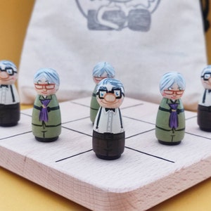 May include: A wooden game board with six painted wooden figures. The figures are all elderly people with white hair and glasses. The figures are standing on a light brown wooden board with black lines.