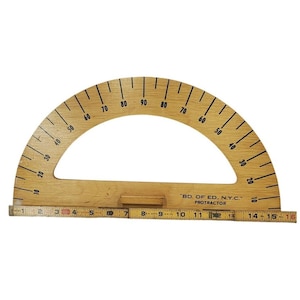 May include: A vintage wooden protractor with a ruler base. The protractor is marked with degree increments from 10 to 90. The ruler base is marked with inch measurements up to 16 inches. The text "BD. OF ED., N.Y.C. PROTRACTOR" is printed on the protractor.