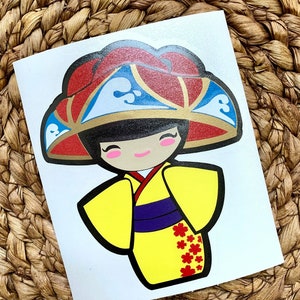 Kokeshi with a Hanagasa vinyl layered and cut decal