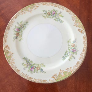 May include: A rustic wooden sign with the text "Welcome to our home" in white lettering. The sign features a distressed finish and a simple, inviting design, perfect for a front porch or entryway.