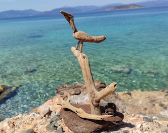 One-of-a-kind driftwood bird sculpture on stand.Shore bird.