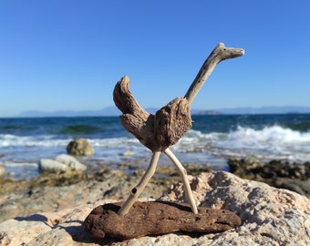 One-of-a-kind driftwood bird sculpture.