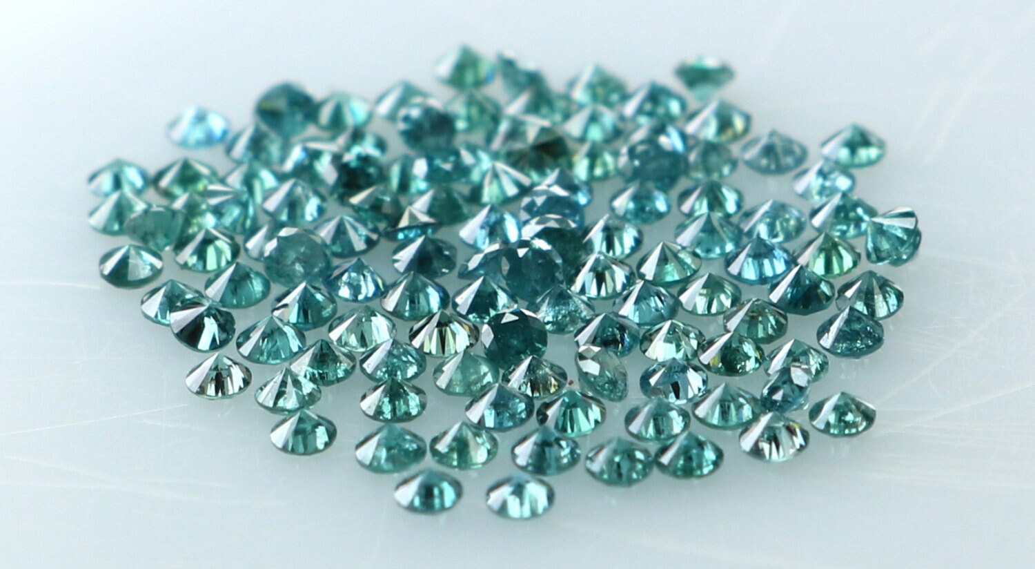 thumbnail image 2 of 100 Pcs Natural Loose Round Diamonds - G-H Color, I1-I3 Clarity, 0.90-1.00mm 2 of 6