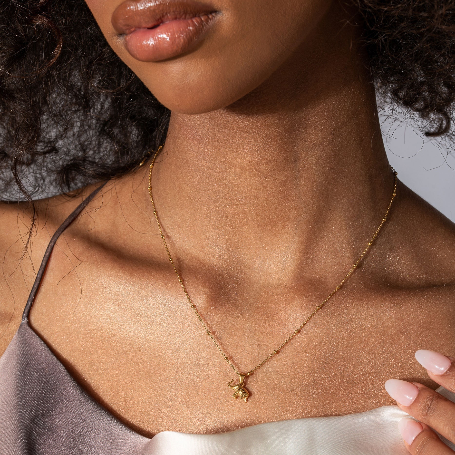 Collana in acciaio inox oro 18k con pendente cuore rigato bombato - Lamù gioielli