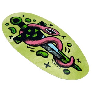 May include: A green and pink snake wrapped around a black and green dagger with a blue blade. The background is a light green with a textured look. The text "RACHILLU" is at the bottom of the image.