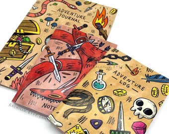May include: Three small, brown paper notebooks with colorful illustrations. The covers feature a treasure chest, a red dragon, and a skull with a compass, potion, and other fantasy elements. The notebooks are titled "Adventure Journal" and "Adventure Log".
