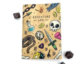 May include: A brown notebook with a cover featuring a hand-drawn pattern of various fantasy adventure items, including a skull, a sword, a potion bottle, a compass, a feather, a rope, and dice. The text "Adventure Log" is written in black across the top of the cover.