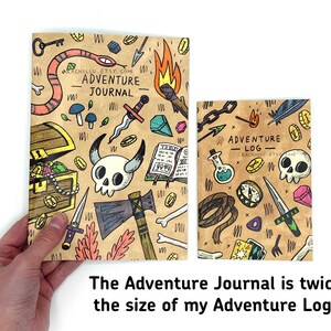 May include: Two adventure journals with illustrated covers. The larger journal is titled "Adventure Journal" and the smaller journal is titled "Adventure Log". Both journals feature a brown background with colorful illustrations of fantasy and adventure items.