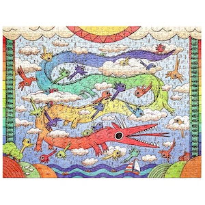 May include: A jigsaw puzzle featuring a colorful illustration of three long, serpentine dragons in red, yellow, and green, flying through a rainy sky filled with clouds, small birds, and a sun. A sailboat and hills are visible at the bottom.