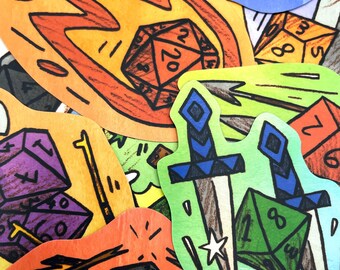 May include: A collection of colorful stickers featuring hand-drawn illustrations of multi-sided dice, swords, and arrows. The designs include a twenty-sided die surrounded by orange flames, a green eight-sided die, and blue-hilted swords.