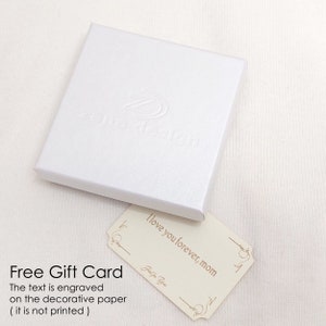 May include: A white gift box with a small white card that says "I love you forever, mom" and "Just for You". The box has the words "zama design" embossed on the top. The card is a free gift card with the text "The text is engraved on the decorative paper (it is not printed)".