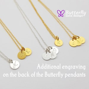May include: Three gold and silver necklaces with initial charms. Each necklace has a different set of initials. The necklaces are on a white background. The text "Butterfly zana design" is in the top right corner of the image. The text "Additional engraving on the back of the Butterfly pendants" is at the bottom of the image.